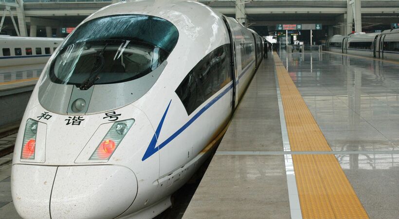 A high-speed train departs Beijing