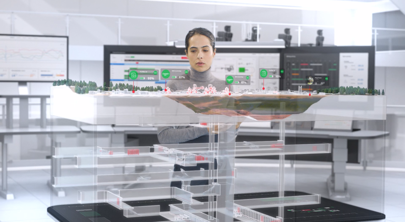 An ABB engineer working on a mine design project encompassing electrification and automation and seamlessly integrated systems across the entire plant.