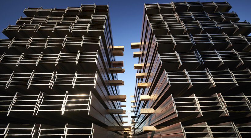 Stacks of steel beams in Nucor's Berkley shipping yard (source: worldsteel)