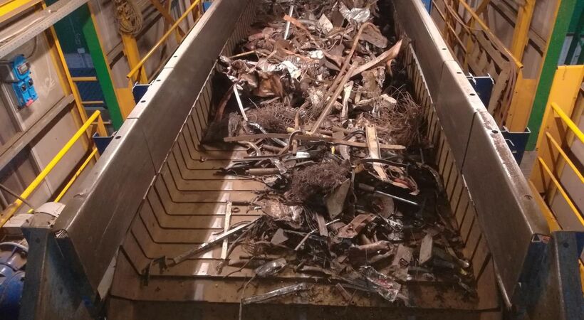 Magaldi's EAF scrap infeed conveyor system in action.